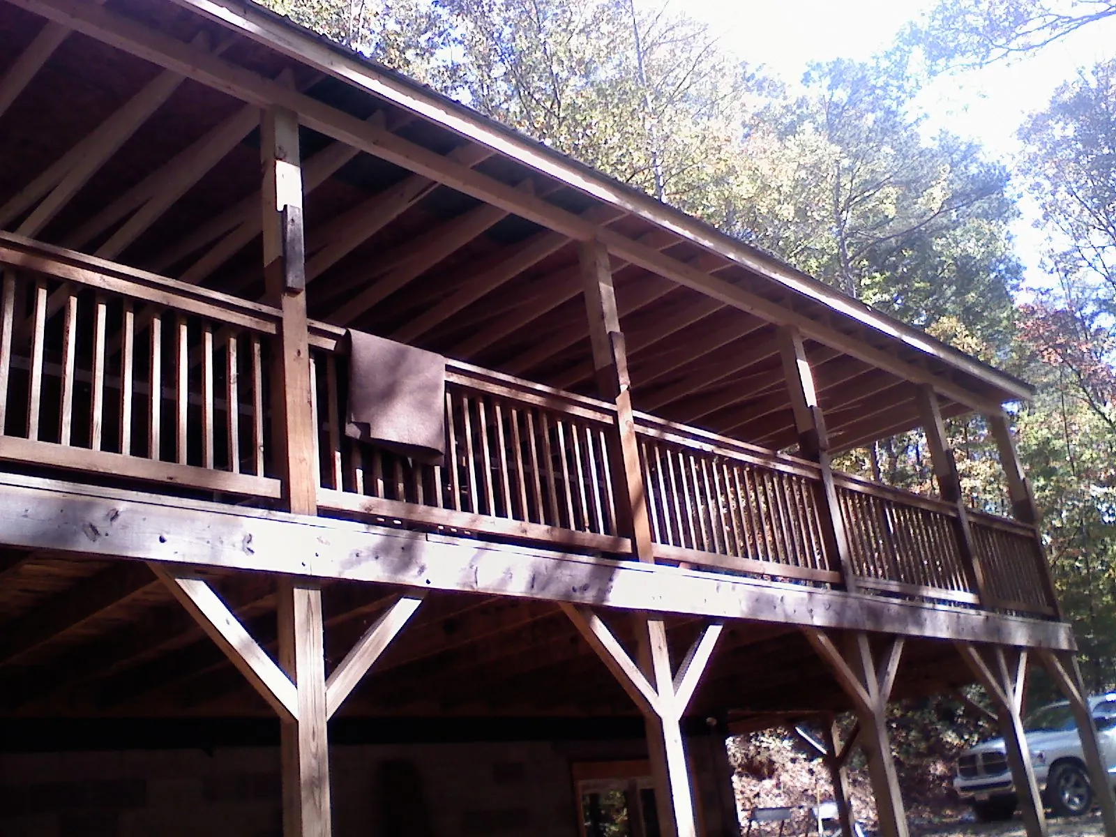 Timber framing under a new elevated porch and deck in Oakland Gardens